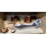 A Shelf of Collectables includes large Highland Stone ware fish server, highland cat scene plate,