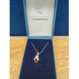 9ct yellow gold necklace with a 9ct yellow gold pendant set with a single pear shaped garnet and