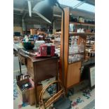 A large interior lamp along with bamboo style magazine rack