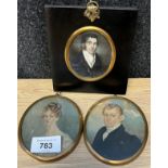 Three 19th century painted portraits.