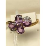 10ct yellow gold ladies ring set with gem stones. [Ring size P] [2.25Grams]