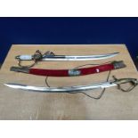 A Reproduction officers short sword with attachment along with Indian saber sword with scabbard
