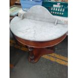 A 19th century demi lune hall table with marble top