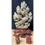 A Large hand carved Chinese soapstone peacock and flower design sculpture, Together with two Chinese