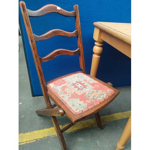 A 19th century folding chair