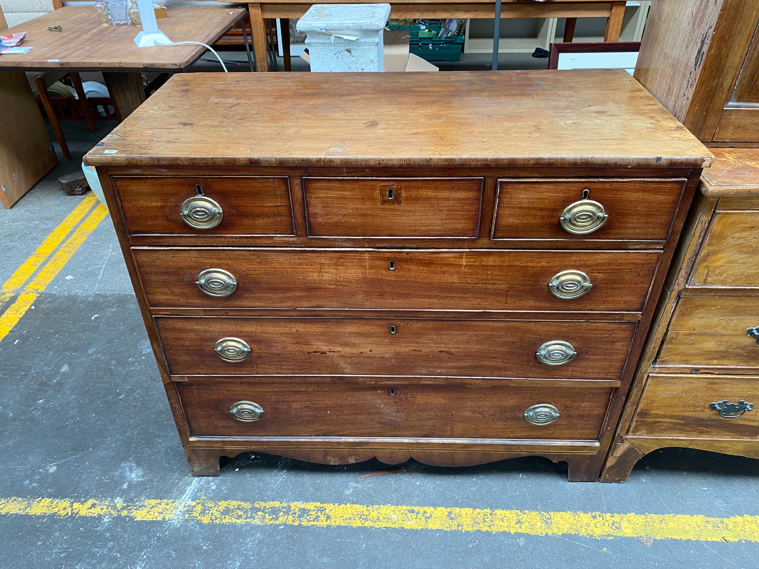 A large Victorian 3 over 3 chest of drawers