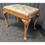 19th century oak stool, the upholstered cushioned seat raised on cabriole legs with carved shell