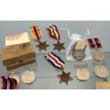 A Selection of WW2 medals and one WWI Medal. The French, African and Italian stars, WWI Medal