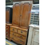 A 19th century linen press with 2 over 2 chest