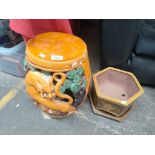 A Chinese village ceramic stool with tiger foliage along with hexagonal planter with resting plate