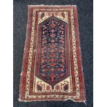 Hand woven Middle Eastern rug, red ground [180x102cm]