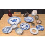 A Collection of Chinese porcelain items; Qing Dynasty blue and white dragon design cup and saucer,