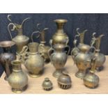 A Collection of Antique brass worked Indian Snake handled ewer jugs and vases. The lot also includes