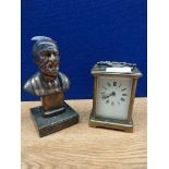 A 19th century brass French carriage clock along with Hippocrates Greek bust