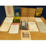 A collection of Greek pamphlets includes 'The Moments of Greece and along with German pamphlet