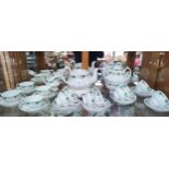 A Large Victorian English themed tea service includes tea pot