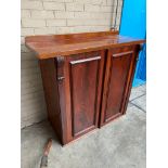 An antique mahogany 2 door cupboard