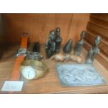 A collection of African items along with 3 gents wrist watches includes fuyate