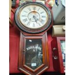 An Antique Ansonia American wall clock with pendulum