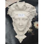 A french style woman head wall sconce