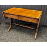 20th century mahogany drop end table, the rectangular top above two short drawers, raised on trestle