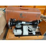 An Antique Singer sewing machine converted with casing