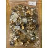 A bag of military and police buttons