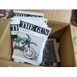 A Box of Old magazines titled the Gun motorcycles