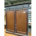 A vintage 2 door cupboard with fitted drawer