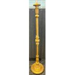 Antique gilt painted free standing light, raised on a circular base and bun feet [179cm]