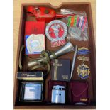 A Tray of interesting items; Small vintage red oil can, WW2 Medals, B.M.A Car badge, Acme whistle,