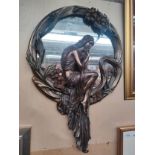 An art deco style decorative wall mirror