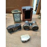 A french brass carriage clock, 2 pair of opera glasses along with small purse and a bone bounded