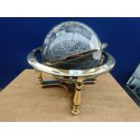A Large Brass semi precious globe on brass stand with fitted compass
