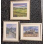 Anne Watson Three pastel drawings 'Bamburgh Castle', 'Corfe Castle' and 'Tuscan Landscape', signed.