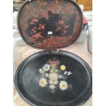 A 19th century lacquered tray with flower foliage along with oriental themed tray