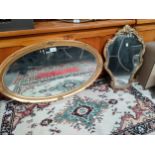 A Gilt Framed oval mirror along with other
