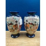 A Pair of satsuma geisha scene vases signed to the base