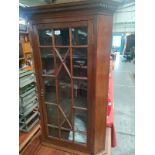 A 19th Century wall mounted corner cabinet
