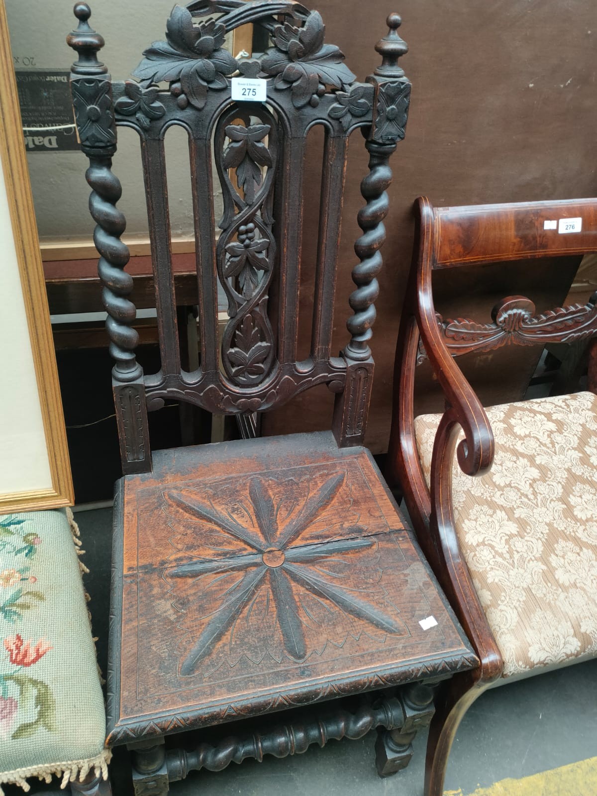 A 19th century Carved high back chair