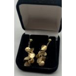 A Pair of 9ct yellow gold drop earrings. [3.87grams]