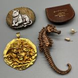 Various vintage jewellery items; Sphinx Mythology Medallion pendant 1970's, Africa Simba hand made