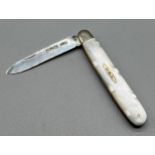Sheffield silver and mother of pearl fruit knife. Fitted with a silver cartouche with initials H.M.