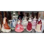 Shelf of lady figurines; Royal Doulton The Paisley Shawl HN1392, Genevieve HN1962, Diana,