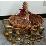A Basket containing a collection of antique brass weights.