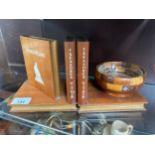 A set of wooden hand made bookends