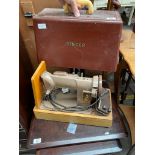 Vintage Singer sewing machine within a carry case.