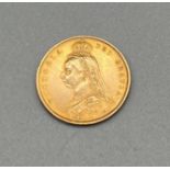 1887 Queen Victoria gold half sovereign coin.