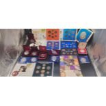 A Collection of Boxed mint coins and sets; UK Uncirculated coin set 1986, Canadian coins and many