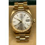 An 18ct yellow gold Gent's Rolex Oyster Perpetual Datejust Wristwatch, White dial with baton